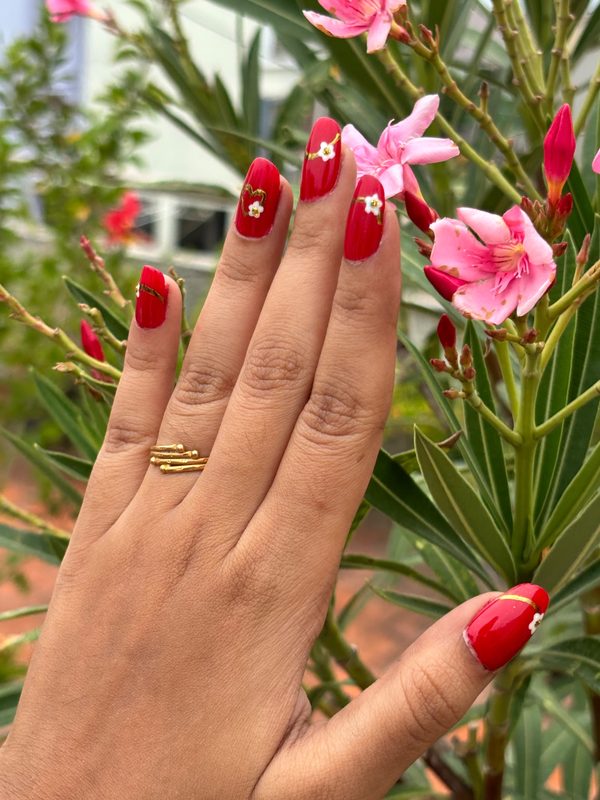 Red floral nail art Chennai